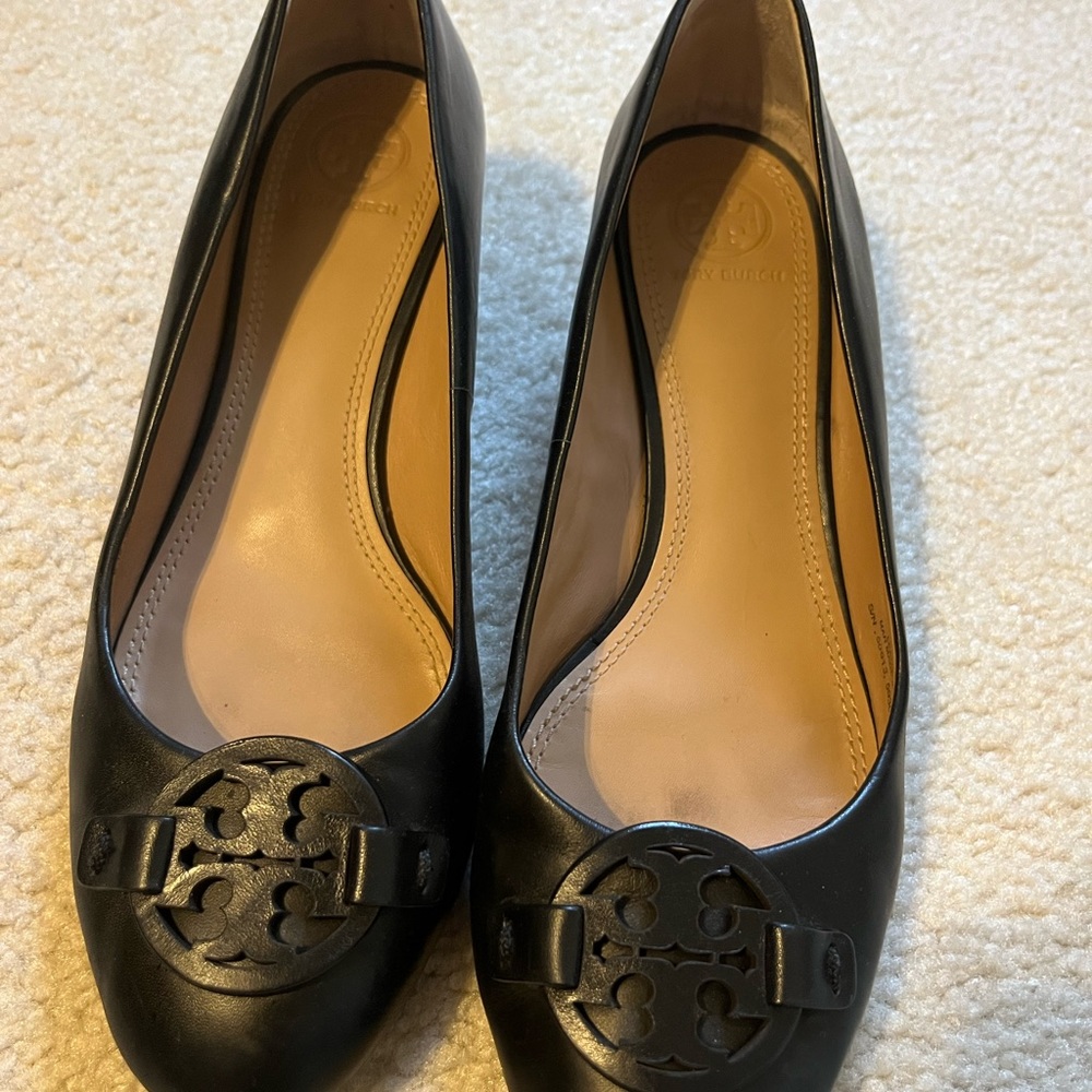 Tory Burch size 7.5 slip on closed shoes with small wedge.